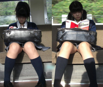 電車対面パンチラ！太ももの向こうにあるパンツwwwの画像