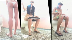 海水浴場近くのトイレでビキニ姿でおしっこしてるお姉さんや水着に着替えてる様子を盗撮の画像